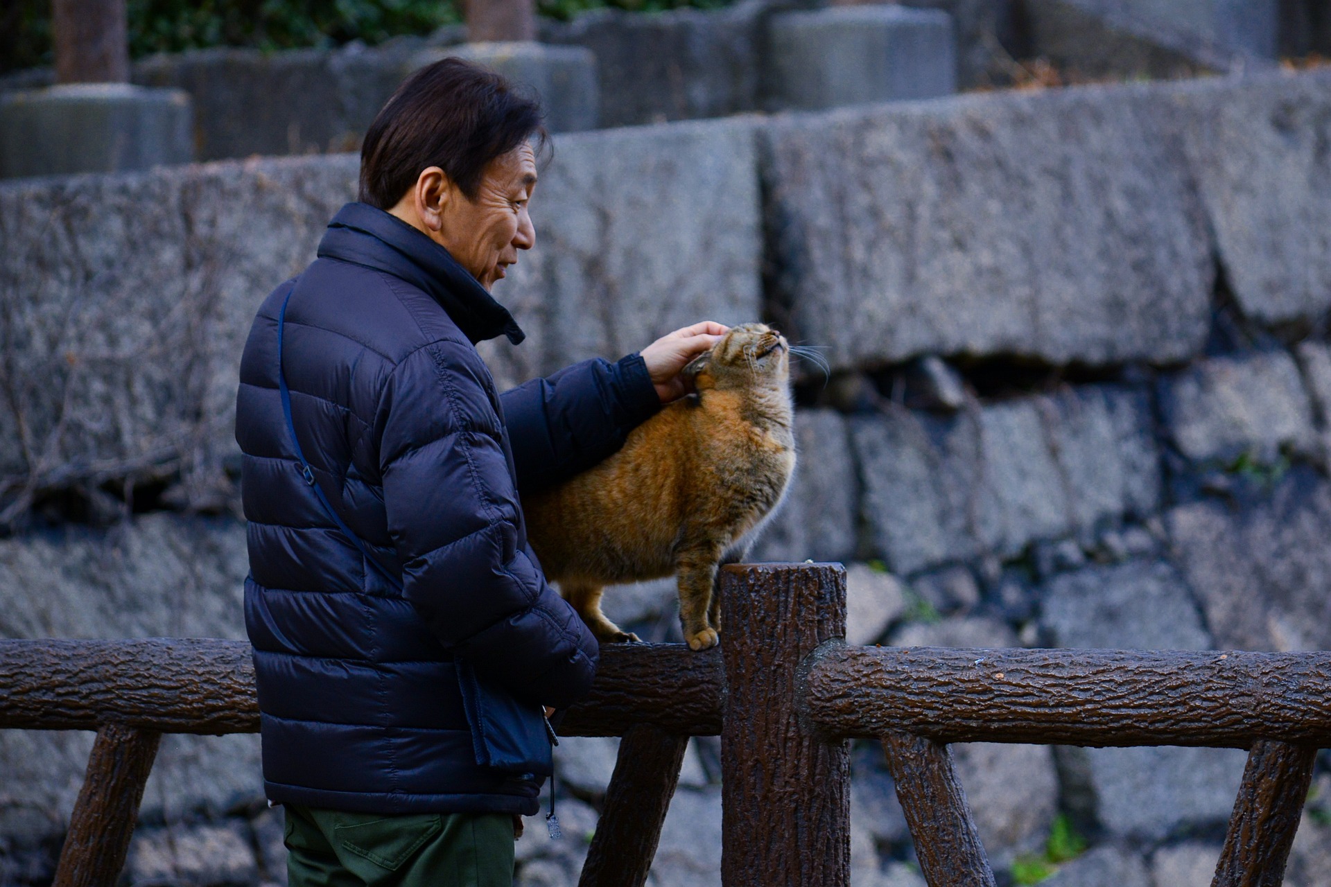 A man with a cat